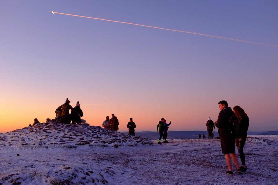 Hikers on a frosty mountain