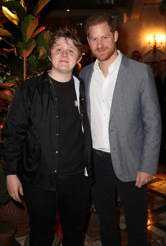  Singer Lewis Capaldi poses with the Duke of Sussex at The Ivy