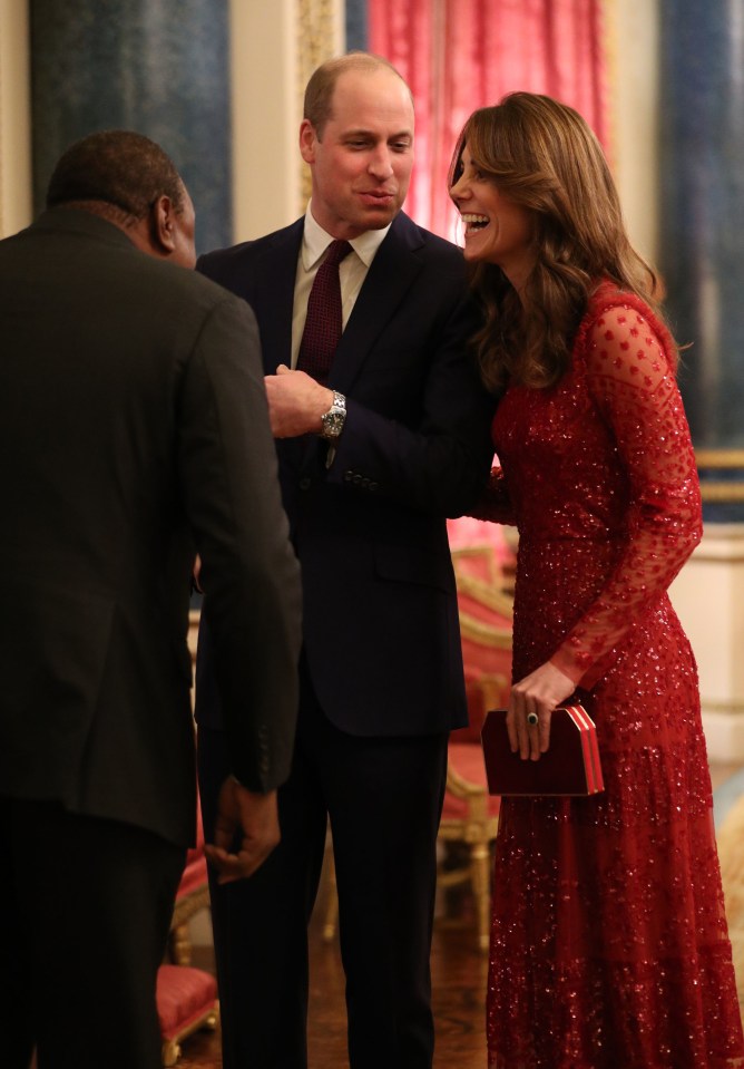 The Duke and Duchess of Cambridge welcome guests to the reception