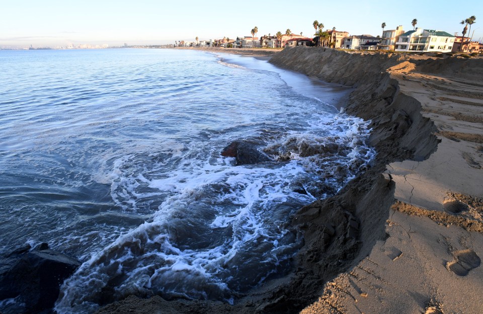  Waves from the king tide crashing against the sand in Long Beach, New York this month