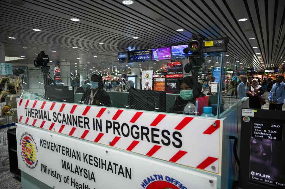  Signs have been erected at Kuala Lumpur International Airport warning passengers they will be screened