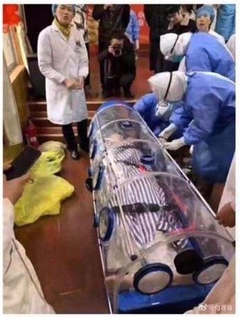  A picture posted on social media appears to show a patient being covered to prevent infecting others