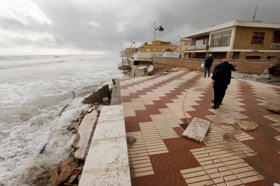  The storm ravaged promenade of El Perello village in Valencia