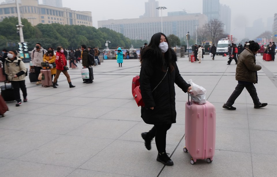  Despite being advised against travel, airports and train stations remained busy due to Chinese New Year plans