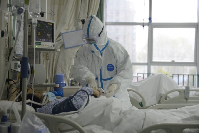  Medical staff tending to a patient at the The Central Hospital Of Wuhan