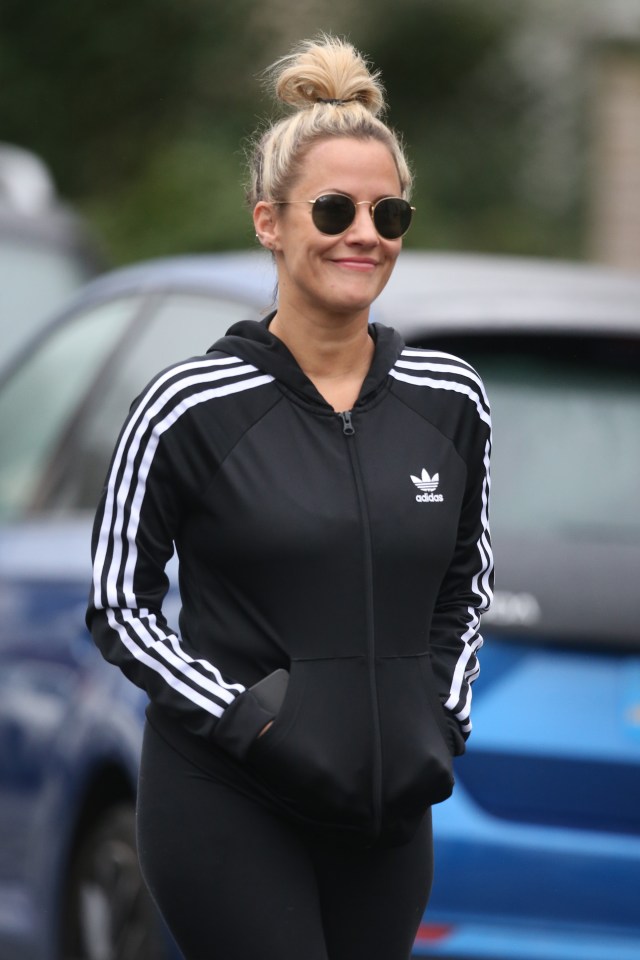 Caroline Flack is seen back in London after jetting to California