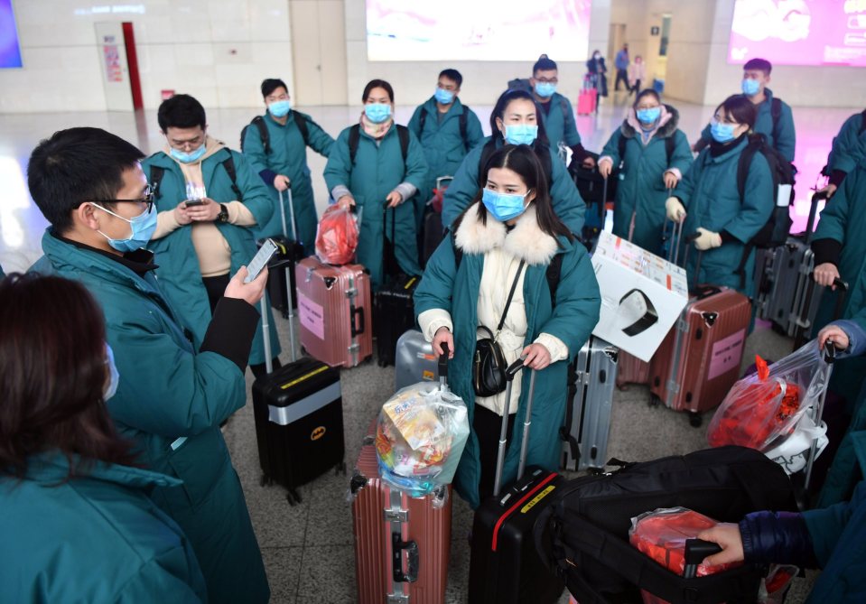  Medical staff gather at Zhengzhou East Railway Station in China's Henan province