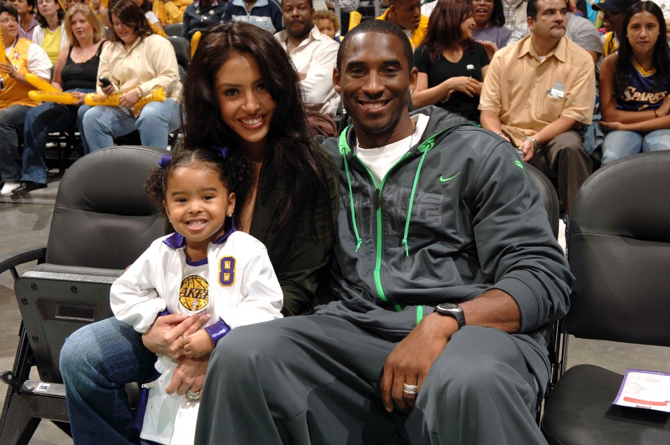  Bryant poses with wife Vanessa and then-youngster Natalia at LA's Staples Center in 2005