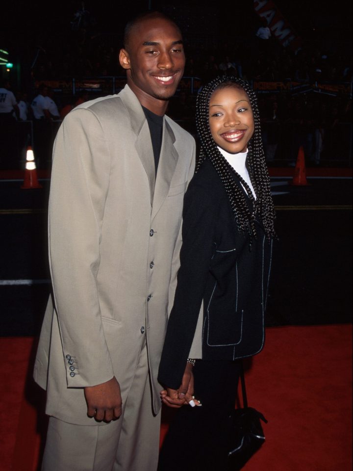  Bryant is pictured with R&B star Brandy, whom he took to senior prom as a teen