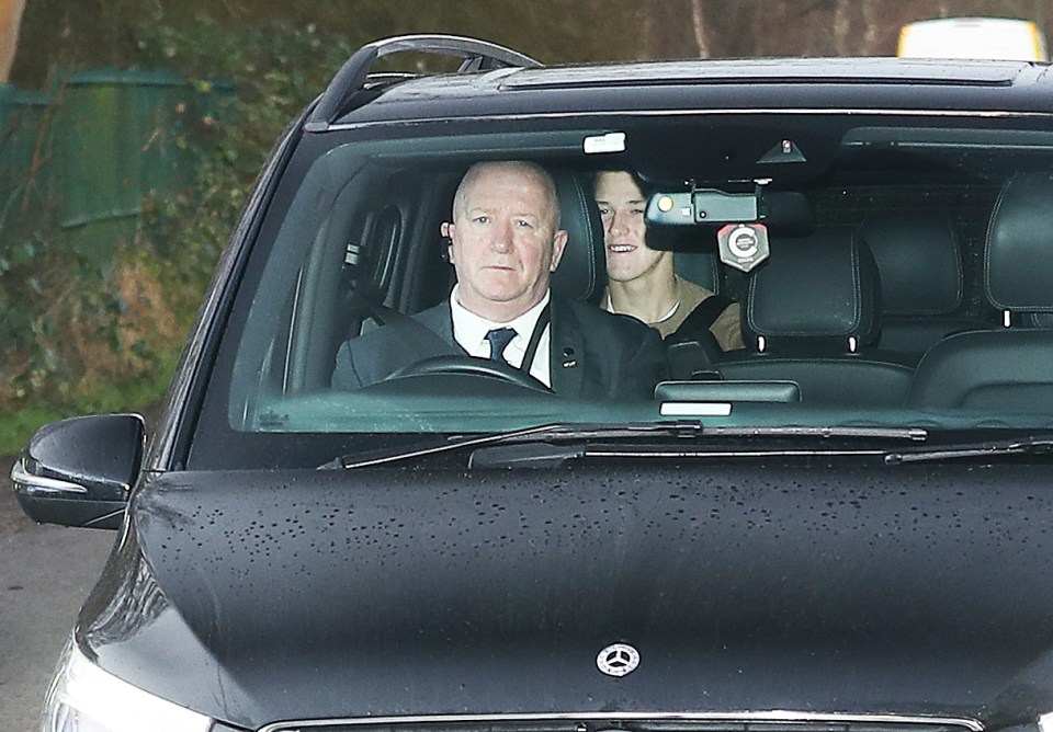  A mystery man was spotted being driven to Man Utd training this morning