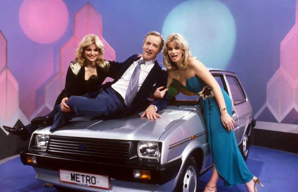  Nicholas Parsons with Sale of the Century hostesses Eunice Denny and Laura Beaumont