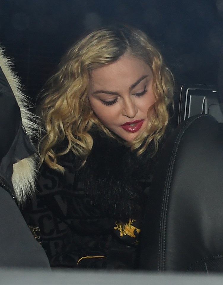  Madonna leaves the Madame X Tour at the London Palladium wearing a Versace dressing gown