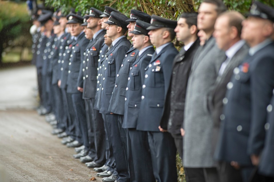  A guard of honour met the firefighters carrying the dad's coffin