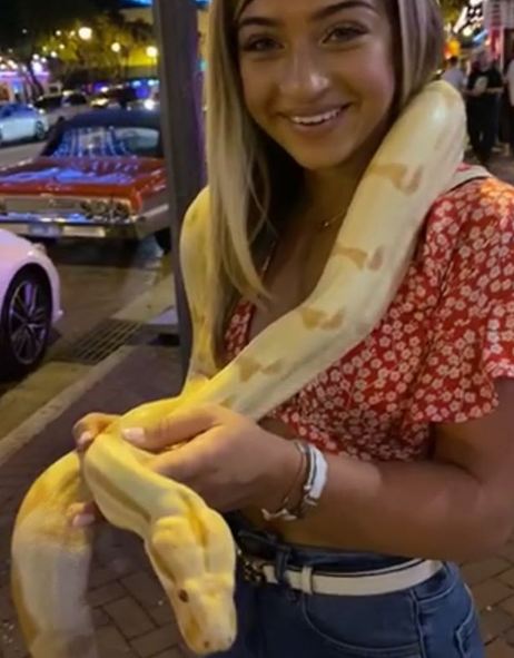  The 47-year-old applauded his eldest daughter for her 'bravery' as she held a snake