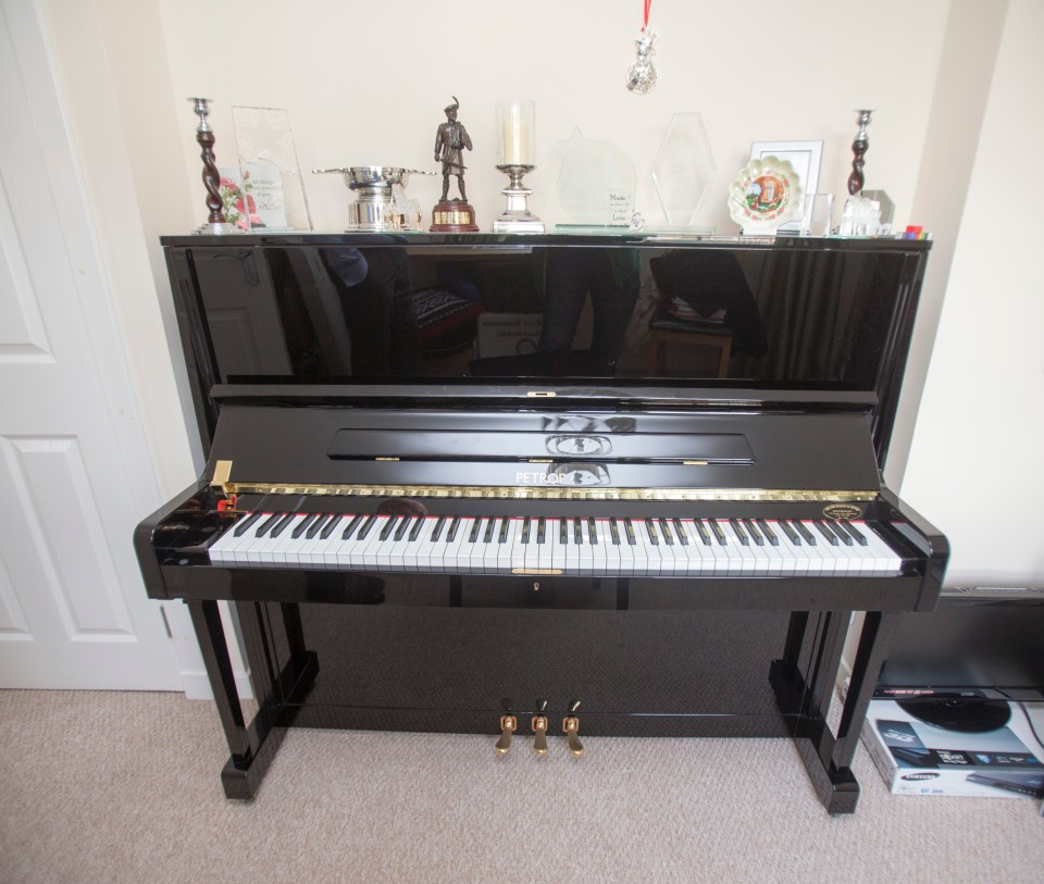 Susan has also kitted her home out with a music area, featuring a piano and numerous religious ornaments sitting along the top