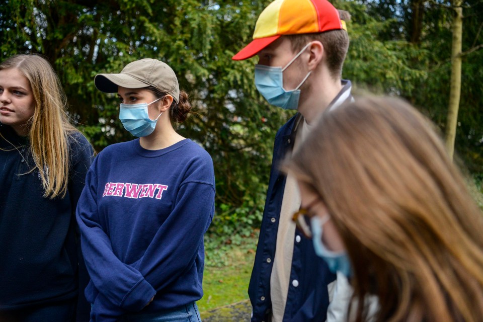 Students at the University of York wearing facemasks after one of their fellow students was diagnosed with coronavirus