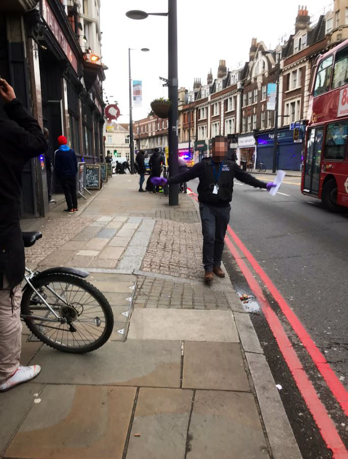  Cops were yelling at people to 'get back' as people appeared to be receiving medical help along the pavement