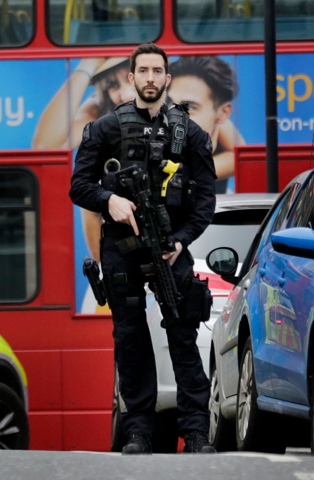  Armed cops raced to the south London high street after a number of people were stabbed