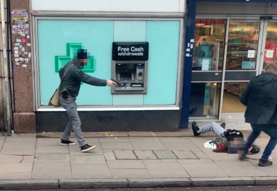 Undercover cops holding handguns stand over Islamist maniac Sudesh Amman in  Streatham, London, yesterday