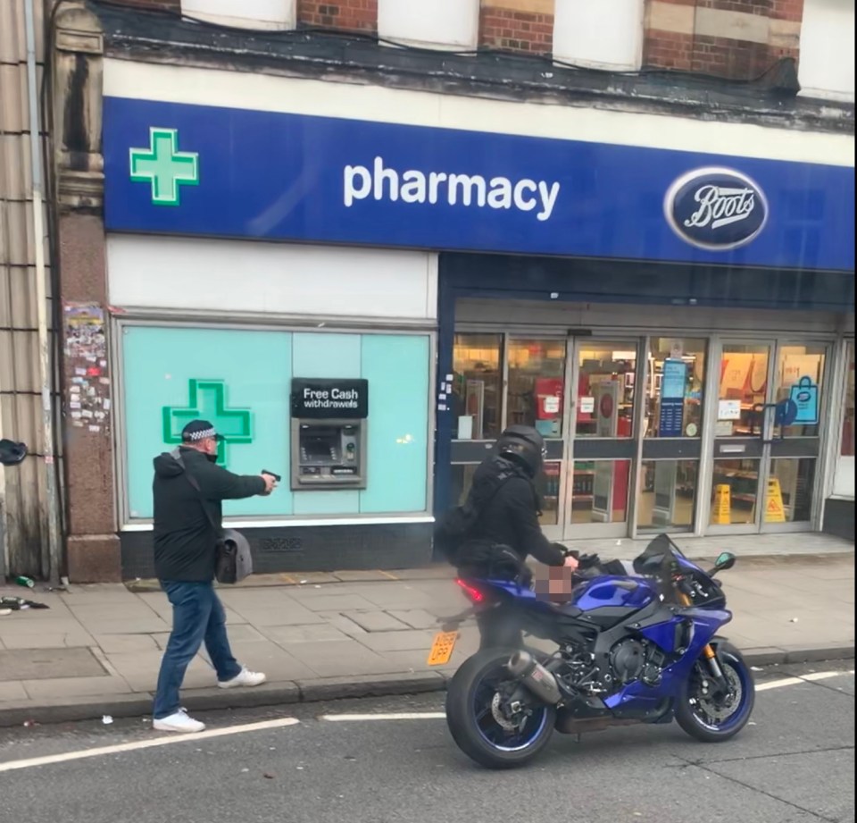  An officer leaps of a motorbike in scenes akin to an action movie