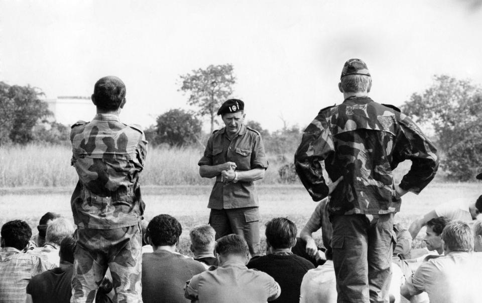 Mike gives instruction to other soldiers in Kamina, Congo, in 1964