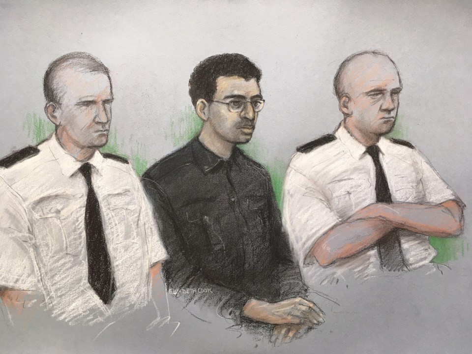  Hashem Abedi flanked by security guards in court