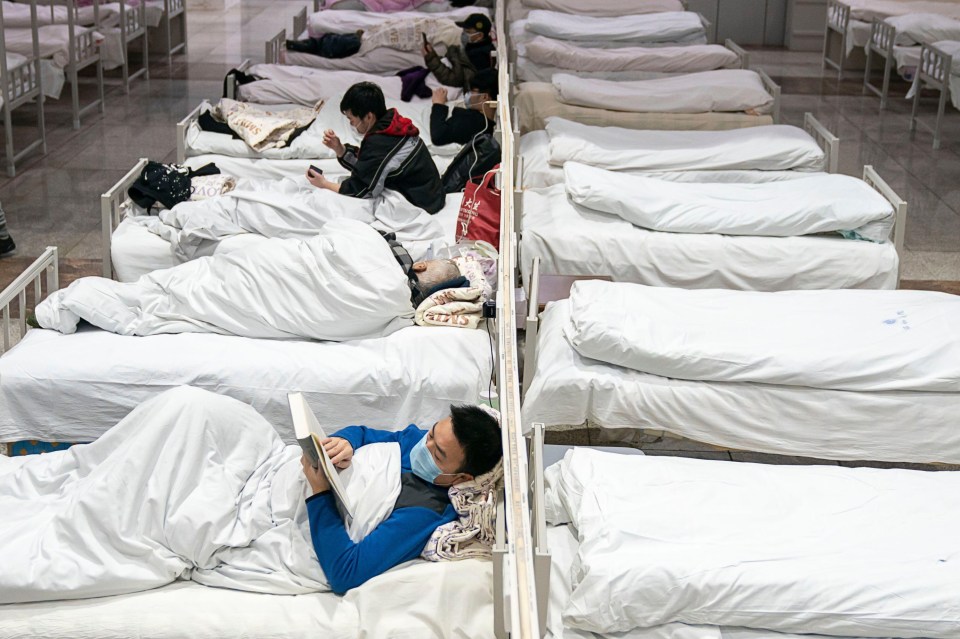  Patients infected with the novel coronavirus are seen at a makeshift hospital 