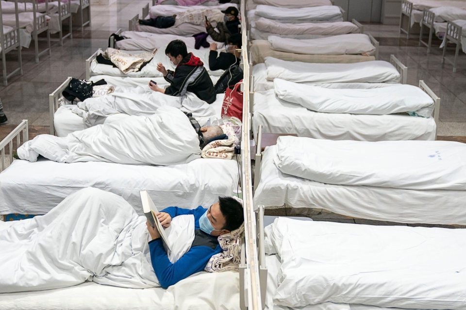  Patients infected with the novel coronavirus are seen at a makeshift hospital