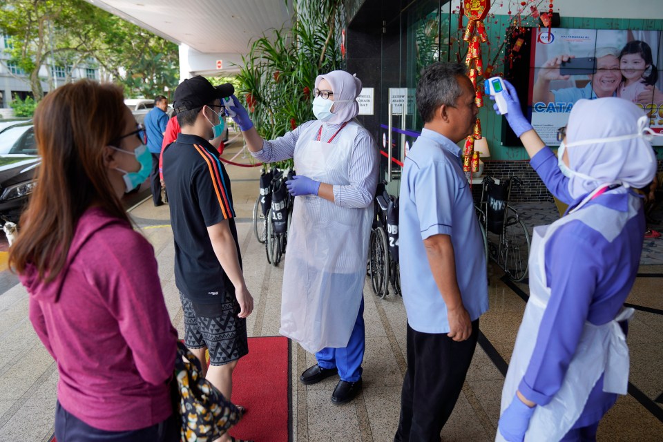  Malaysia has increased checks and stopped flights as reported cases of coronavirus rise