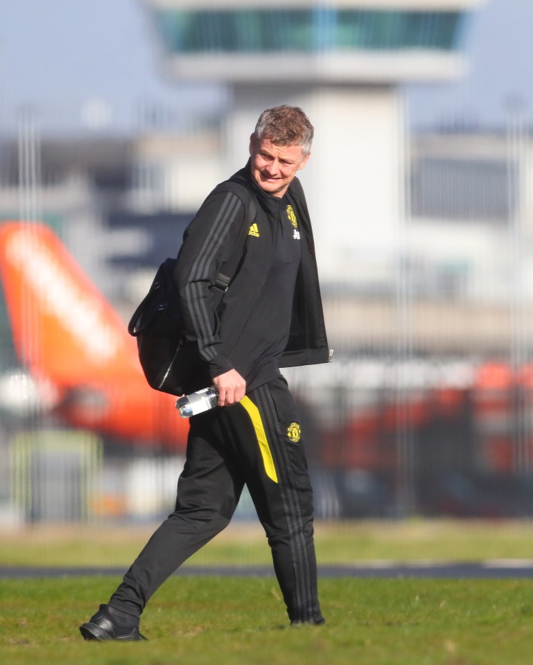  Ole Gunnar Solskjaer leads the team out to the private terminal at Manchester Airport