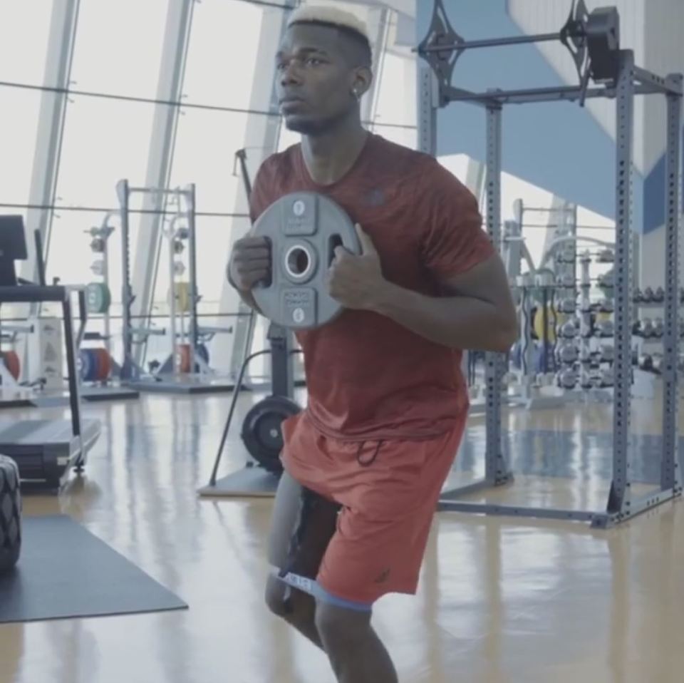  Paul Pogba looked a happy bunny as he trained in a gym out in Dubai