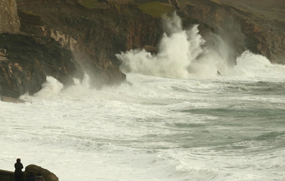  Winds gather pace whipping up waves on the Cornish coast at Porthleven