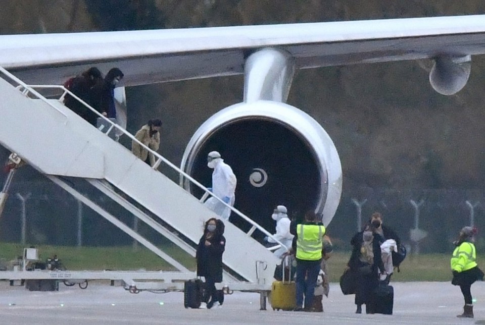 More than 200 people were on the flight from Wuhan