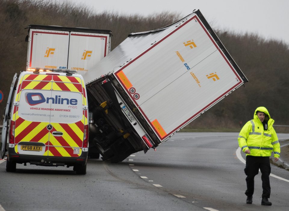  A lorry is blown over by the winds in Dover