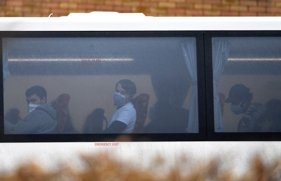  Passengers aboard a convoy of coaches carrying British nationals evacuated from Wuhan in China arrive at Kents Hill Park conference centre and hotel in Milton Keynes