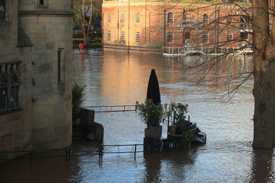  Floodwater surrounds Dyls cafe, York, in the aftermath of Storm Ciara