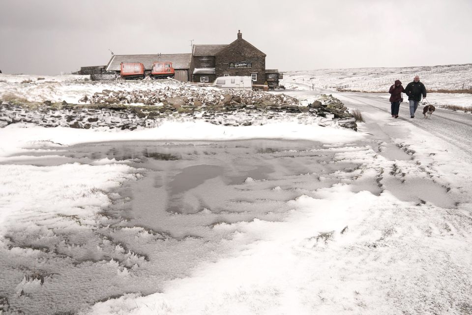  Snowy conditions at the Tan Hill Inn in Reeth in the Yorkshire Dales