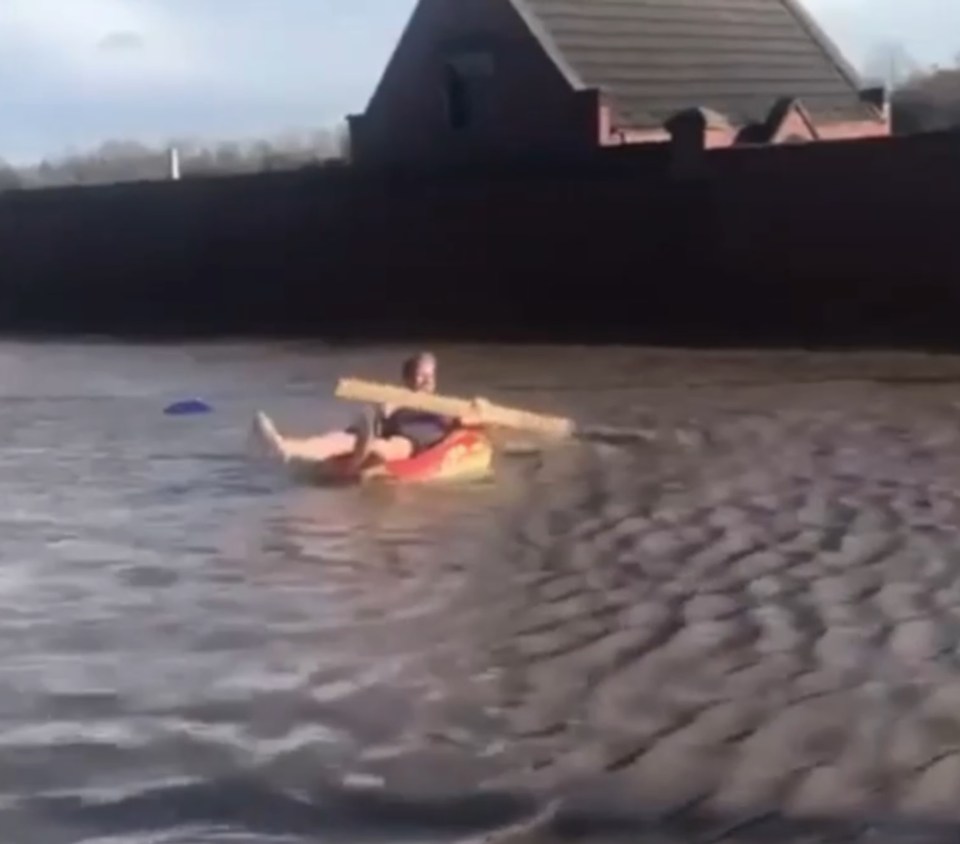  Tony Hargreaves, 45, refused to let wet weather spoil his fun and was seen paddling down Gelderd Road, Leeds