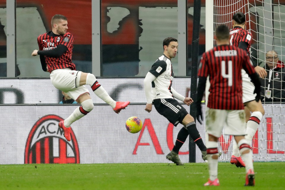  Ante Rebic stroked home a neat volley to give AC Milan the lead