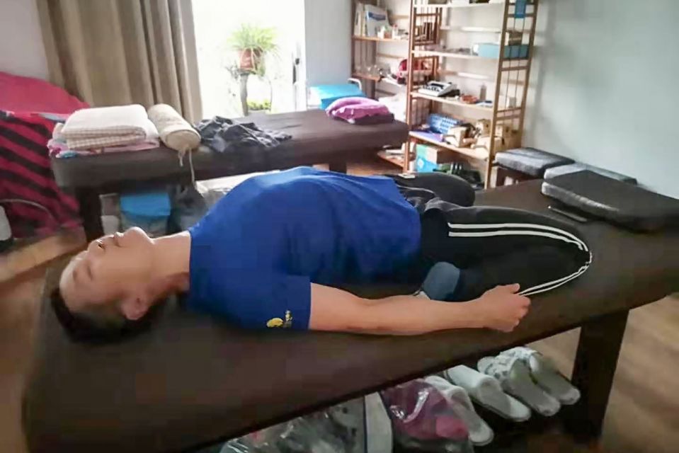  Pan completes exercises in his bedroom as many Chinese come up with novel ways to entertain themselves indoors