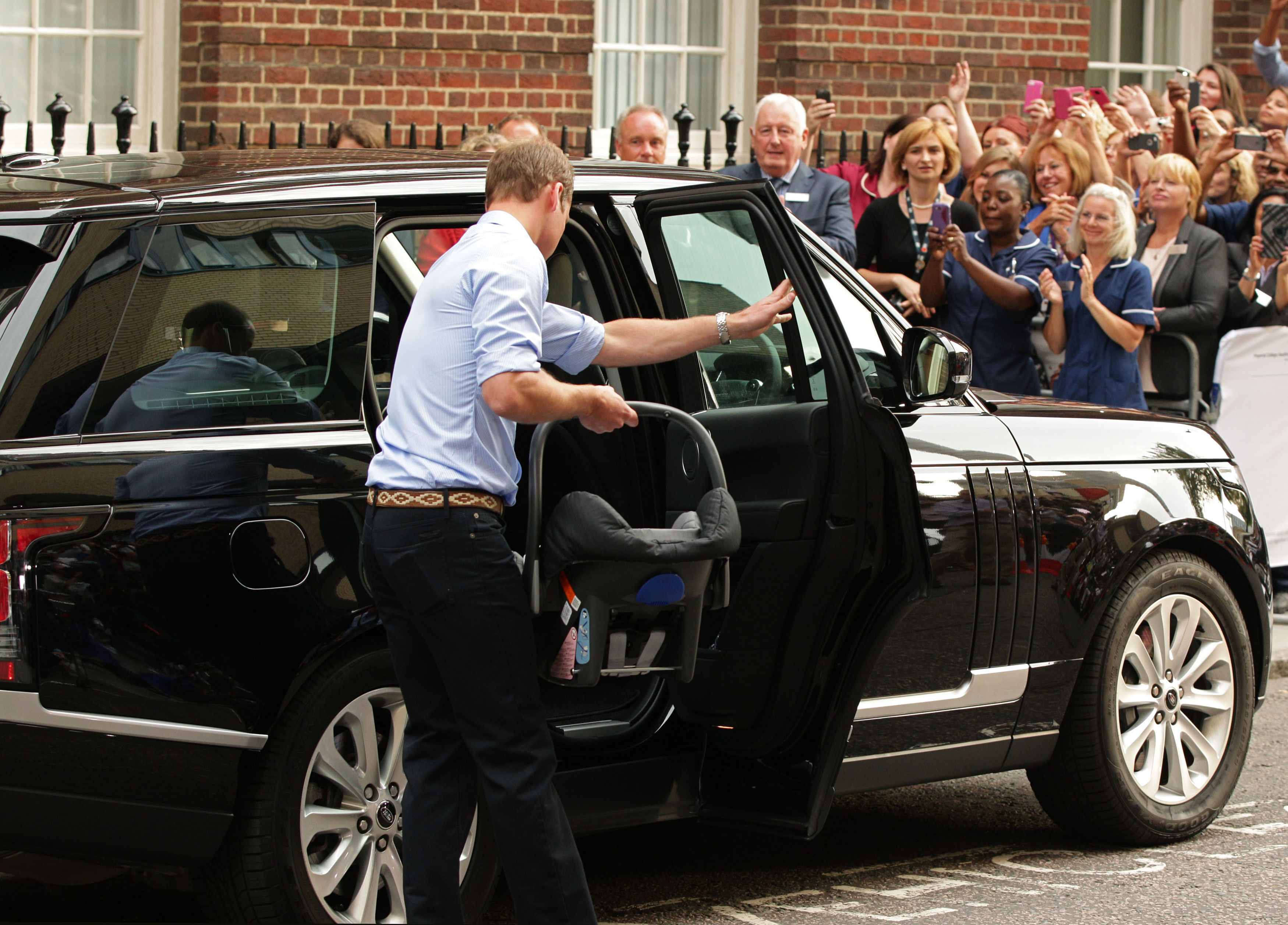 The nation watched as Prince William expertly looked after his new son Prince George in 2013