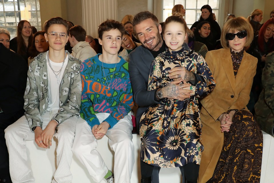  David Beckham beamed with pride as he and children Harper, Romeo and Cruz supported Victoria at her London Fashion Week show