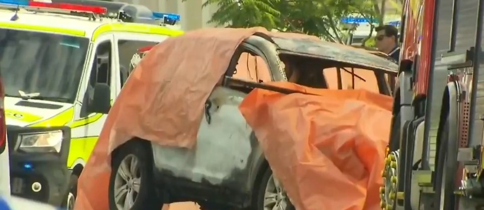  Three children died trapped inside a car that was set alight in Brisbane