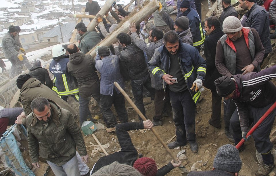  Teams remove collapsed mud-brick constructions in van, Turkey, after the 5.7 magnitude earthquake ripped through the area