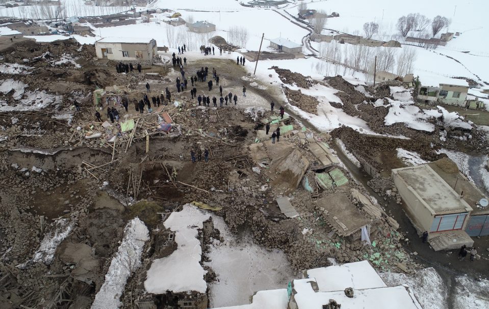  A drone photo shows collapsed buildings in the Baskale district of eastern Van province, Turkey