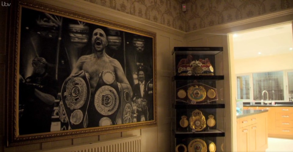  This part of the house is a tribute to Tyson Fury's glittering career so far - there is another belt to add to the cabinet now