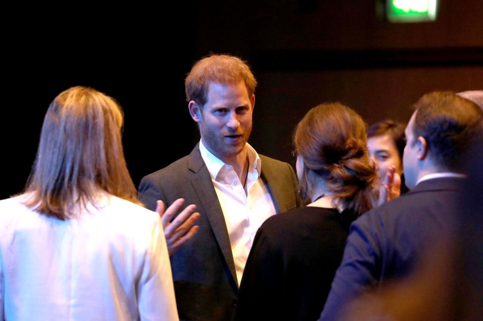  The Duke of Sussex chats animatedly with people at today's event in Edinburgh