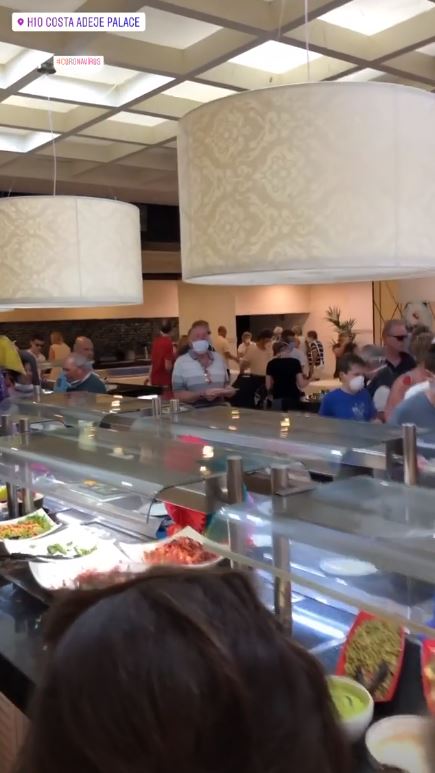  Guests feed themselves at the hotel's buffet despite the coronavirus threat