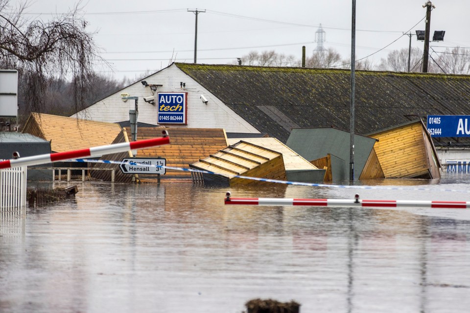  Sheds float in flood water in Snaith, East Yorkshire, where the deluge has wreaked havoc