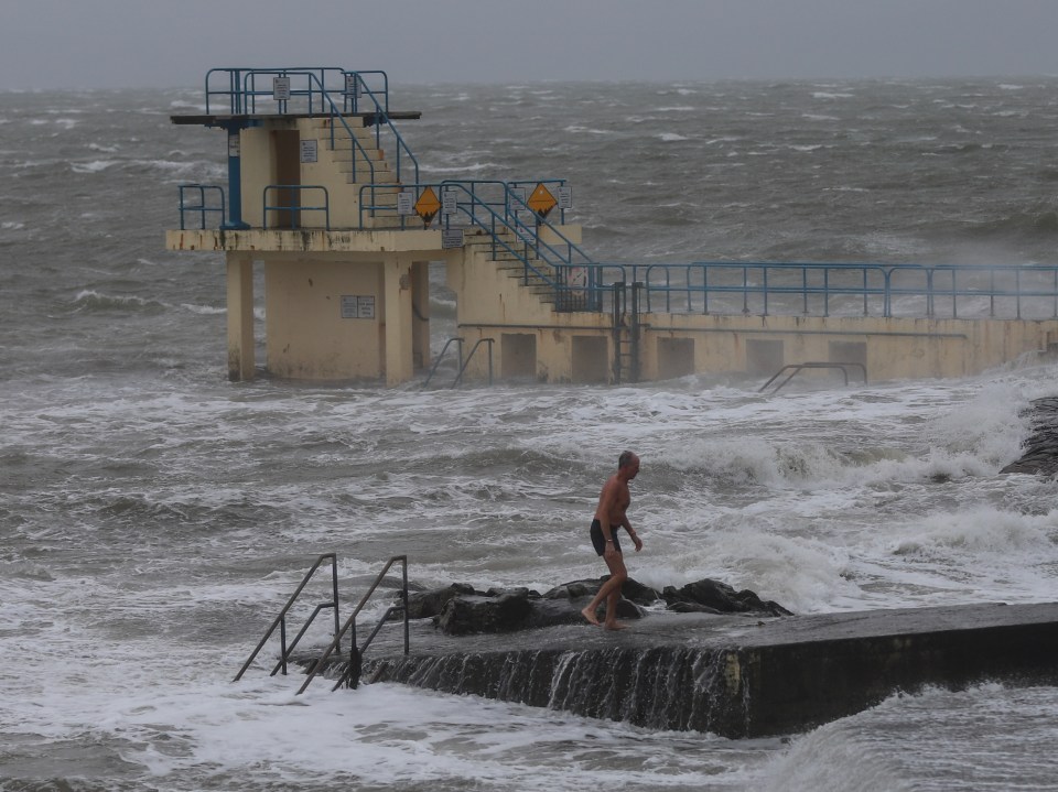  A brave man in Salthill, Galway, took on the elements on his morning swim as Storm Jorge ravaged the west coast of Ireland